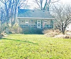 A 4-bedroom house in need of repairs & updates