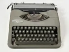 1950'S HERMES ROCKET TYPEWRITER & COVER