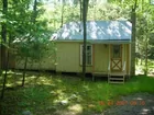 cabin on approx 1 ac.