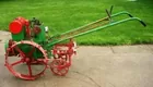 Red E walk behind tractor Braun & Helmer