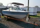 LYN LIECHTY AUCTIONS Lot 38C  Crestliner Boat