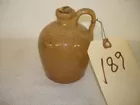 SMALL BROWN JUG HILTON N.C.