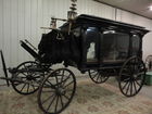 Horse drawn funeral hearse
